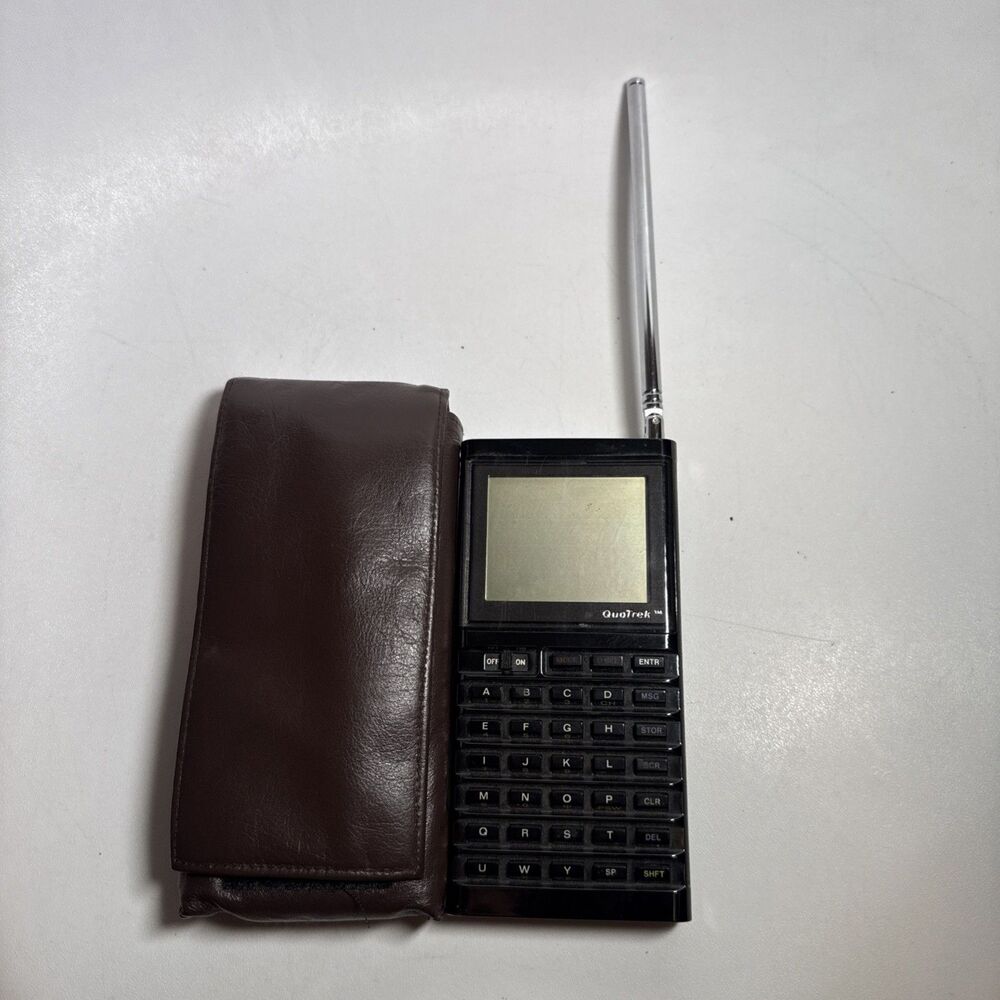 Vintage 1980's Quotrek Handheld Stocks & Commodities Trading Tool. Untested